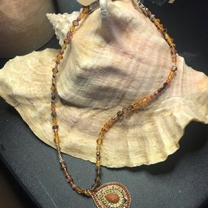 Necklace with jeweled pendent